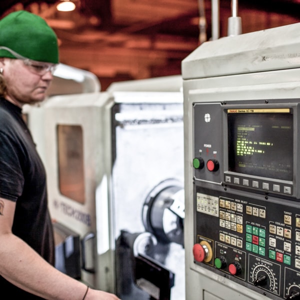 Manufacturing at Anderson Industries on a lathe